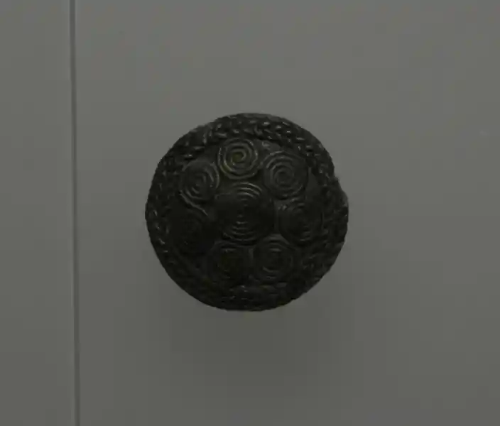 Bronze discs adorned with solar symbols